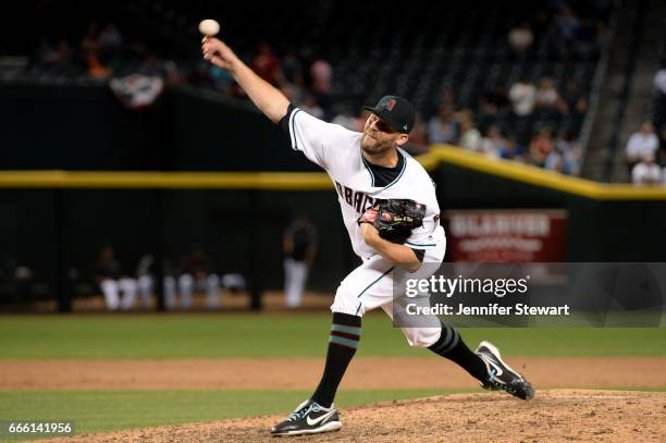 Tom Wilhelmsen of the Arizona Diamondbacks delivers a pitch in the ninth inning against the San Francisco Giants at Chase Field on April 4, 2017 in...