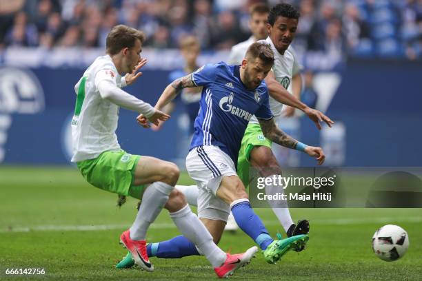 Guido Burgstaller of Schalke scores a goal to make it 1-0 during the Bundesliga match between FC Schalke 04 and VfL Wolfsburg at Veltins-Arena on...