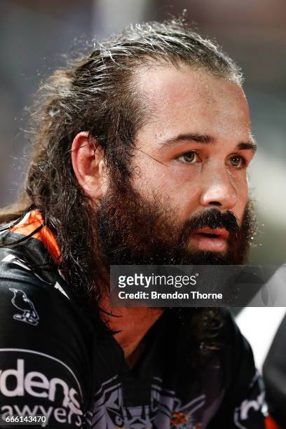 Aaron Woods of the Tigers looks on during the round six NRL match between the North Queensland Cowboys and the Wests Tigers at 1300SMILES Stadium on...