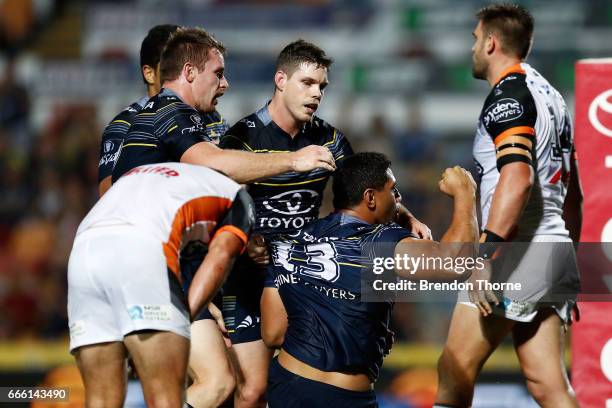 Jason Taumalolo of the Cowboys celebrates after scoring a try during the round six NRL match between the North Queensland Cowboys and the Wests...