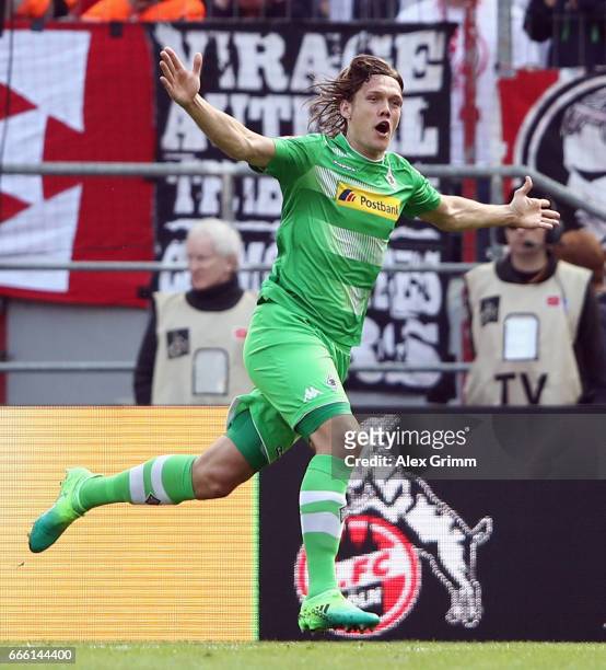Jannik Vestergaard of Moenchengladbach celebrates his team's first goal during the Bundesliga match between 1. FC Koeln and Borussia Moenchengladbach...