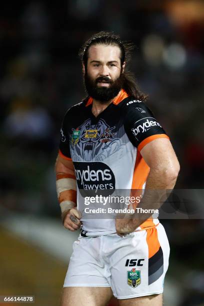 Aaron Woods of the Tigers looks on during the round six NRL match between the North Queensland Cowboys and the Wests Tigers at 1300SMILES Stadium on...