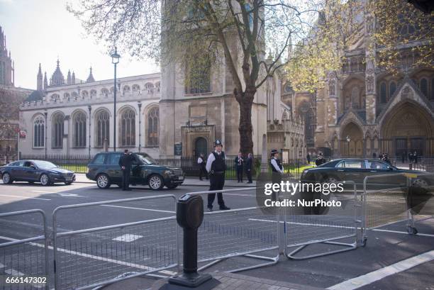 Policemen attend members of The Royal Family for the Memorial Service at St. Margaret's church in Westminster, London on April 7, 2017. The service...