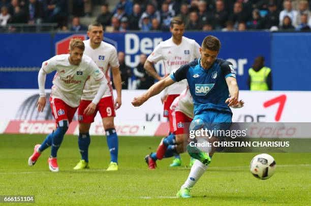 Hoffenheim's Andrej Kramaric scores during the German first division Bundesliga football match Hamburg SV v TSG 1899 Hoffenheim in Hamburg, northern...