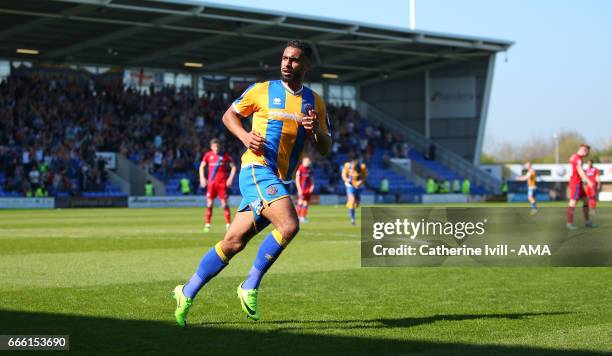 Stefan Payne of Shrewsbury Town runs off to celebrate after he scores a goal to make it 1-0 during the Sky Bet League One match between Shrewsbury...