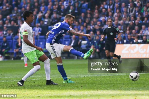 Guido Burgstaller of Schalke scores a goal to make it 4-0 during the Bundesliga match between FC Schalke 04 and VfL Wolfsburg at Veltins-Arena on...