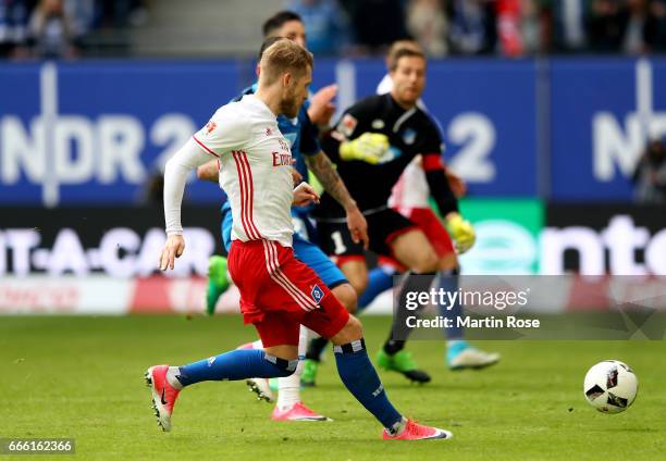 Aaron Hunt of Hamburg is scoring the 2nd goal during the Bundesliga match between Hamburger SV and TSG 1899 Hoffenheim at Volksparkstadion on April...