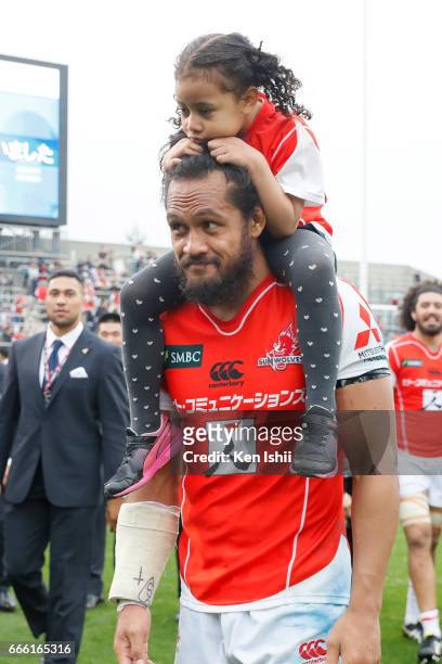Liaki Moli of the Sunwolves celebrates winning the game with his daughter during the Super Rugby Rd 7 match between Sunwolves v Bulls at Prince...