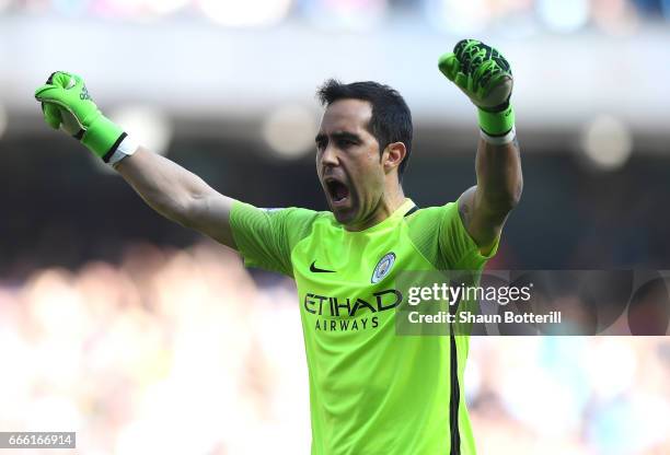 Claudio Bravo of Manchester City celebrates his sides third goal during the Premier League match between Manchester City and Hull City at Etihad...