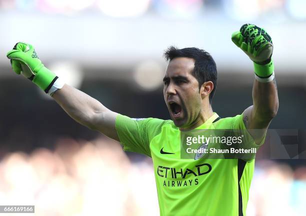 Claudio Bravo of Manchester City celebrates his sides third goal during the Premier League match between Manchester City and Hull City at Etihad...
