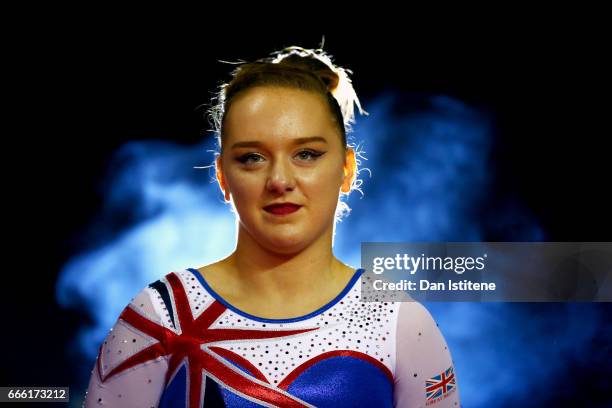 Amy Tinkler of Great Britain walks in to the arena to compete in the women's competition for the iPro Sport World Cup of Gymnastics at The O2 Arena...