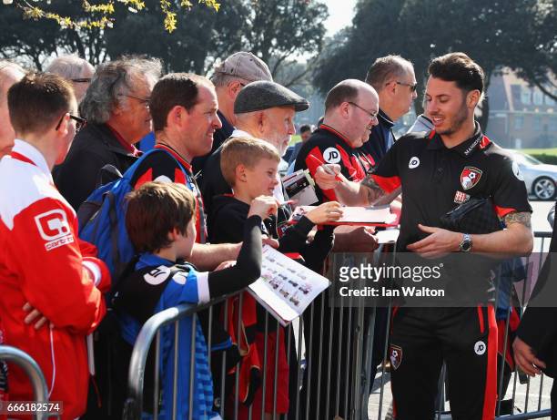 Adam Smith of AFC Bournemouth signs autographs prior to the Premier League match between AFC Bournemouth and Chelsea at Vitality Stadium on April 8,...