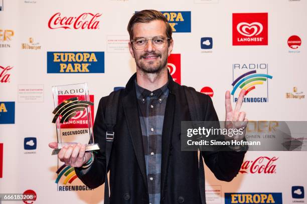 Joko Winterscheidt poses with his award prior to the Radio Regenbogen Award 2017 at Europapark on April 7, 2017 in Rust, Germany.