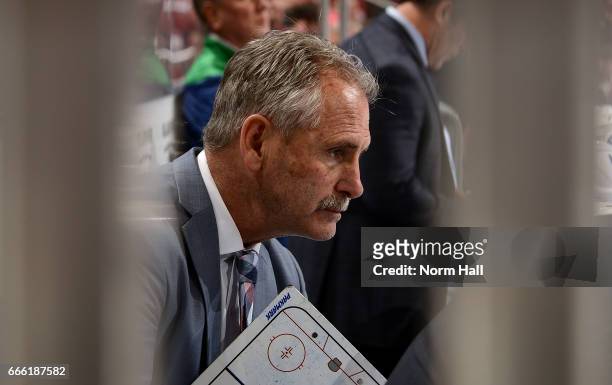 Head coach Willie Desjardins of the Vancouver Canucks looks on from the bench against the Arizona Coyotes at Gila River Arena on April 6, 2017 in...