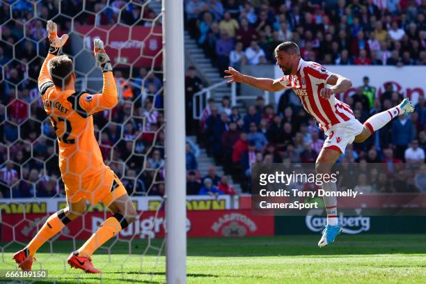 Stoke City's Jonathan Walters scores his sides first goal during the Premier League match between Stoke City and Liverpool at Bet365 Stadium on April...