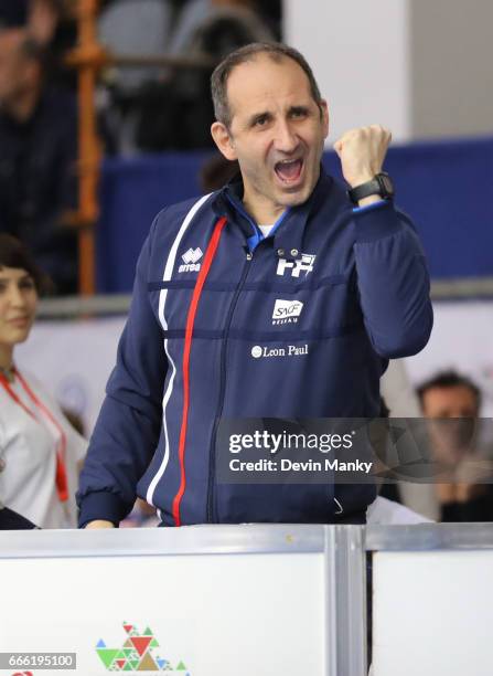 French Epee Coach, and silver medal winner at the 2000 Olympics, Jean Francois Di Martino celebrates a Team France victory over Team USA during the...