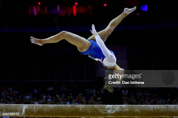 Amy Tinkler of Great Britain competes on the beam during the women's competition for the iPro Sport World Cup of Gymnastics at The O2 Arena on April...
