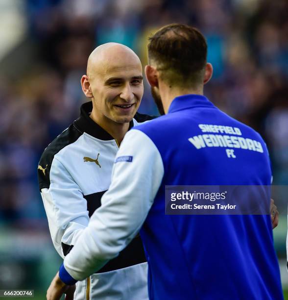 Jonjo Shelvey of Newcastle United smiles at Steven Fletcher of Sheffield Wednesday during the Sky Bet Championship Match between Sheffield Wednesday...