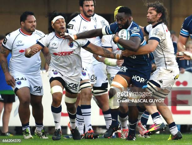 Grenoble's French centre Clement Gelin runs with the ball during the French Top 14 rugby union match between Montpellier and Grenoble at the Altrad...