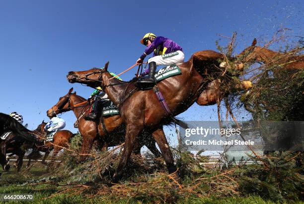 Leighton Aspell riding Lord Windermere jumps over the Canal Turn during the 2017 Randox Heath Grand National at Aintree Racecourse on April 8, 2017...