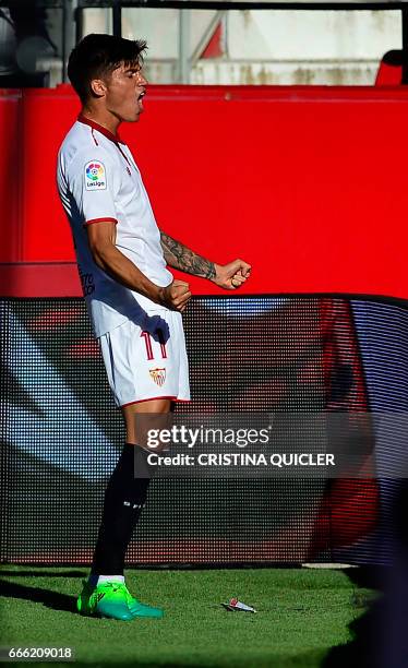 Sevilla's Argentinian midfielder Joaquin Correa celebrates a goal during the Spanish league football match Sevilla FC vs RC Deportivo de la Coruna at...