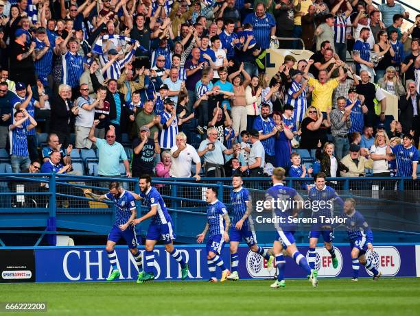 Steven Fletcher of Sheffield Wednesday celebrates with teammates after scoring Sheffield's second goal during the Sky Bet Championship Match between...