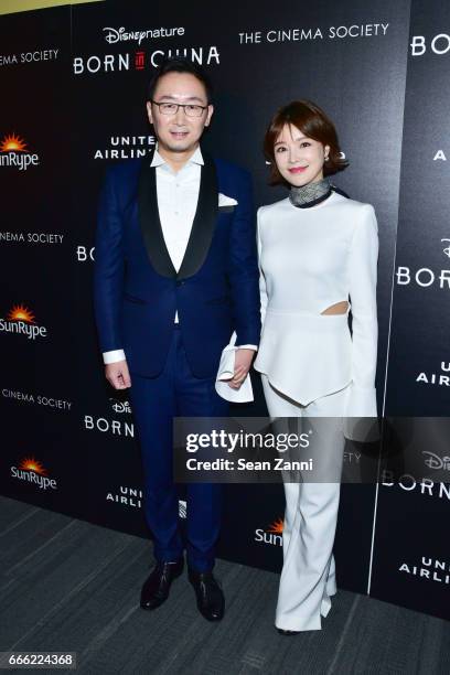 Lu Chuan and Hu Die attend Disneynature and The Cinema Society Host the Premiere of "Born in China" at the Landmark Sunshine Theater on April 8, 2017...