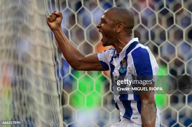 Porto's Algerian forward Yacine Brahimi celebrates after scoring a goal during the Portuguese league football match FC Porto vs Belenenses at the...