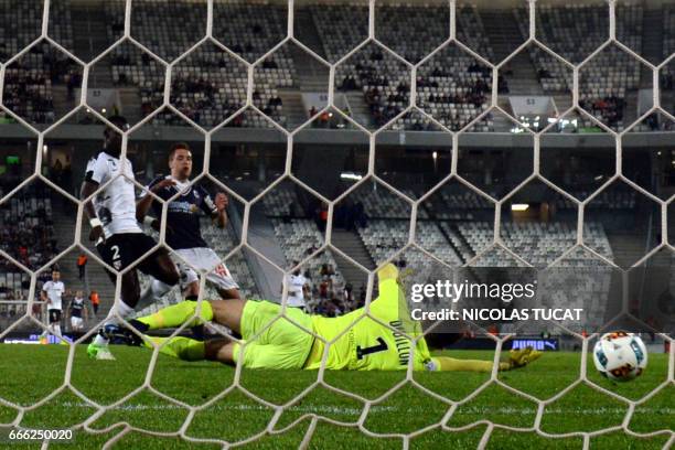 Bordeaux's Argentinian midfielder Valentin Vada scores a goal during the French Ligue 1 football match between Bordeaux and Metz on April 8, 2017 at...