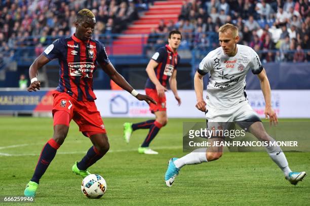 Caen's French forward Yann Karamoh vies for the ball with Montpellier's Czech defender Lukas Pokorny during the French L1 football match between Caen...