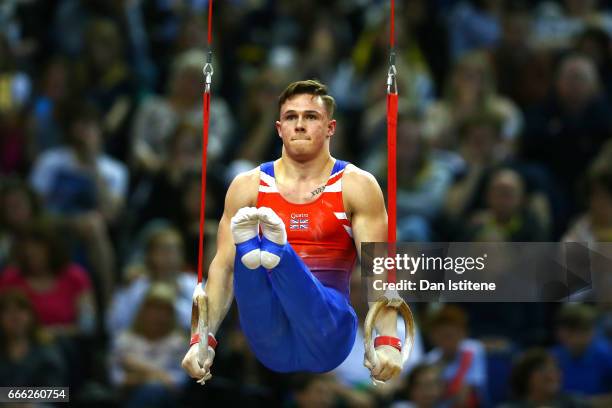 Brinn Bevan of Great Britain competes on the rings during the men's competition for the iPro Sport World Cup of Gymnastics at The O2 Arena on April...