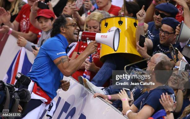Captain of France Yannick Noah celebrates with the supporters the victory 3-0 following the doubles match during the Davis Cup World Group quarter...