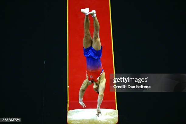 Brinn Bevan of Great Britain competes on the vault during the men's competition for the iPro Sport World Cup of Gymnastics at The O2 Arena on April...