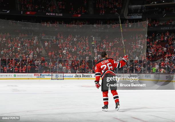 Patrik Elias of the New Jersey Devils who recently announced his retirement, skates in warm-ups prior to the game against the New York Islanders at...