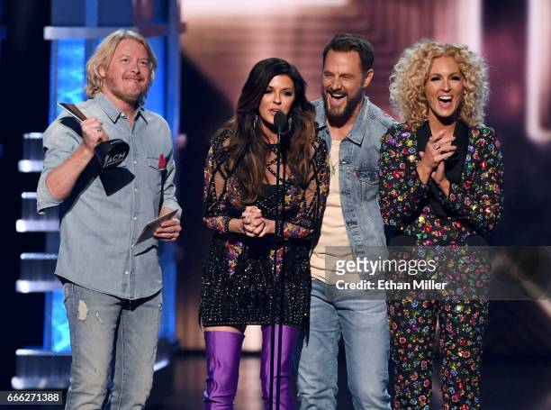 Recording artists Phillip Sweet, Karen Fairchild, Jimi Westbrook and Kimberly Schlapman of Little Big Town accept the Vocal Group of the Year award...
