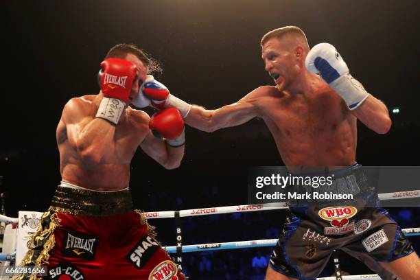 Terry Flanagan lands a punch on Petr Petrov during their WBO World Lightweight Championship fight at Manchester Arena on April 8, 2017 in Manchester,...