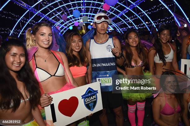 Sean Ro of popular hip hop duo, Jinusean pose for a photograph prior to the start of the United Airlines Guam Marathon 2017 on April 9, 2017 in Guam,...