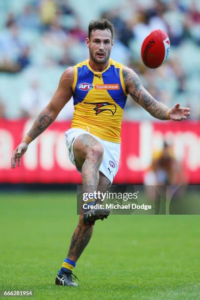 Chris Masten of the Eagles kicks the ball during the round three AFL match between the Richmond Tigers and the West Coast Eagles at Melbourne Cricket...