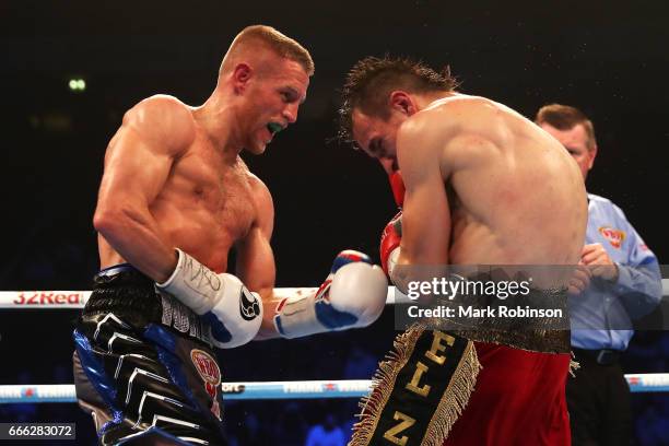 Terry Flanagan throws a punch at Petr Petrov during their WBO World Lightweight Championship fight at Manchester Arena on April 8, 2017 in...