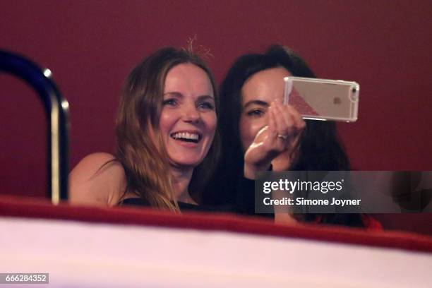 Geri Horner takes a photo on her smartphone as she watches Melanie C with Sally Wood at O2 Shepherd's Bush Empire on April 8, 2017 in London, England.