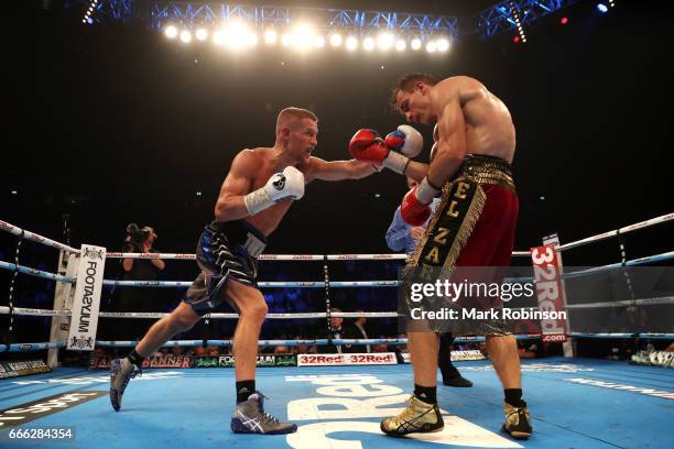 Terry Flanagan throws a punch at Petr Petrov during their WBO World Lightweight Championship fight at Manchester Arena on April 8, 2017 in...