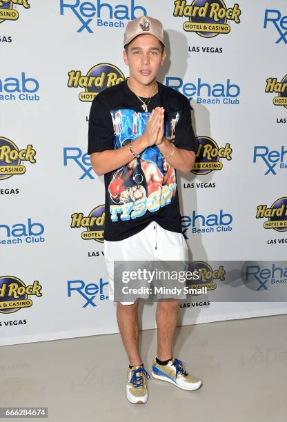 Singer/songwriter Austin Mahone arrives at the Rehab Beach Club pool party to celebrate his 21st birthday at the Hard Rock Hotel & Casino on April 8,...