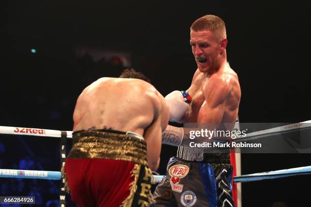 Terry Flanagan throws a punch at Petr Petrov during their WBO World Lightweight Championship fight at Manchester Arena on April 8, 2017 in...