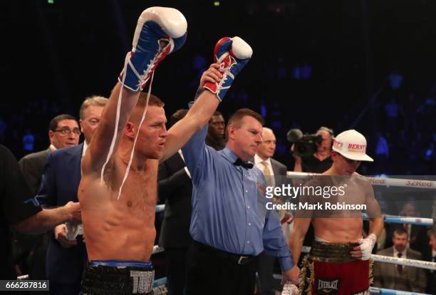 Terry Flanagan celebrates his points victory at the end of his WBO World Lightweight Championship fight against Petr Petrov at Manchester Arena on...