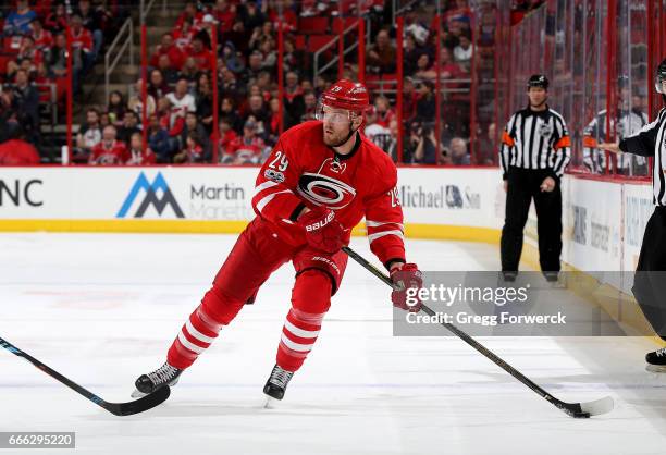 Bryan Bickell of the Carolina Hurricanes controls the puck across the blue line during an NHL game against the St. Louis Blues on April 8, 2017 at...
