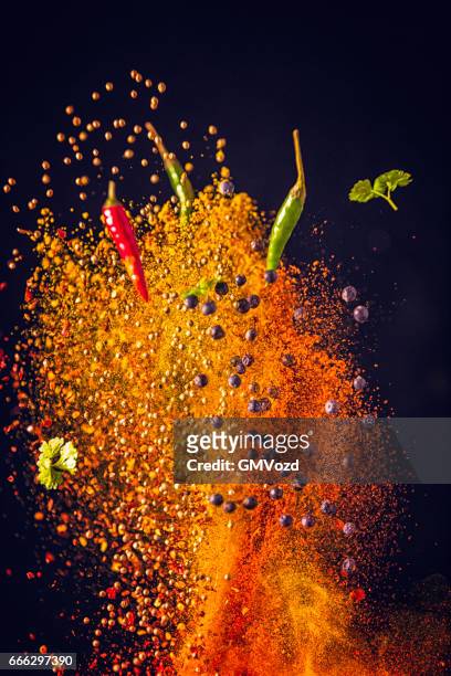 curry spice mix food explosion - spice stock pictures, royalty-free photos & images