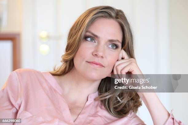 Julia Scharf, 'ARD Sportschau' sport moderator poses during a photo session on April 3, 2017 in Munich, Germany.