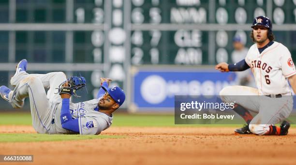 Jake Marisnick of the Houston Astros is out at second base on slide interference on Christian Colon of the Kansas City Royals in the seventh inning...