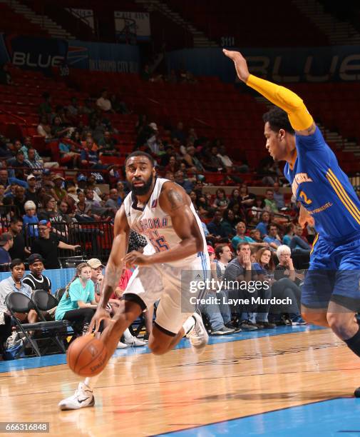 Reggie Williams of the Oklahoma City Blue drives against Jabari Brown of the Santa Cruz Warriors during the first round of an NBA D-League playoff...