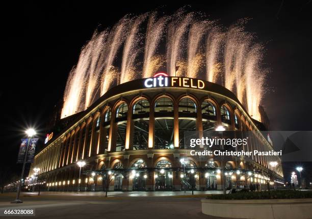 Pyrotechnics light up the night sky above Citi Field after the game between the Miami Marlins and New York Mets on April 8, 2017 in the Flushing...